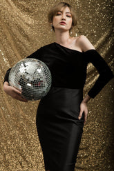 Velvet pencil skirt with tailored silhouette and satin contrast for elevated evening dressing